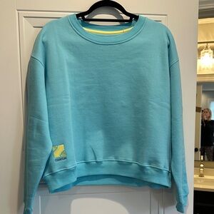 Courtlife Tennis Light Blue Crewneck Sweatshirt with Yellow Accent